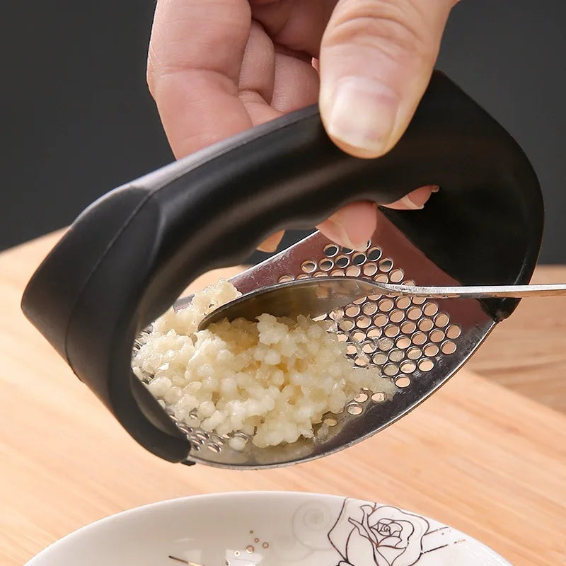 Premium Stainless Steel Garlic Press – Effortless Crushing and Mincing